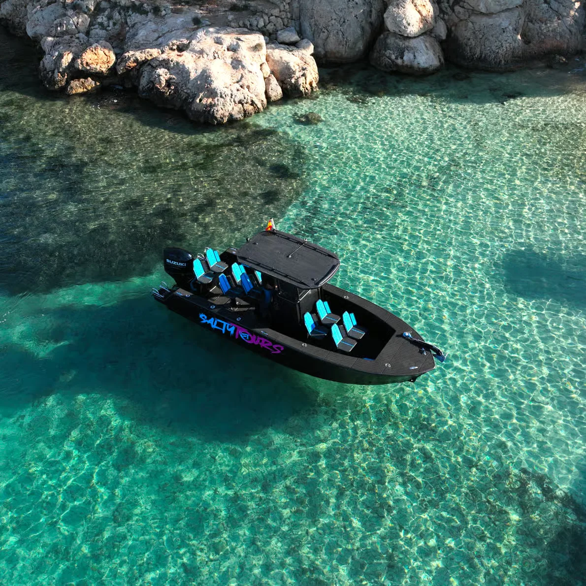 Palma Bay boat tour with snorkeling and paddle surf