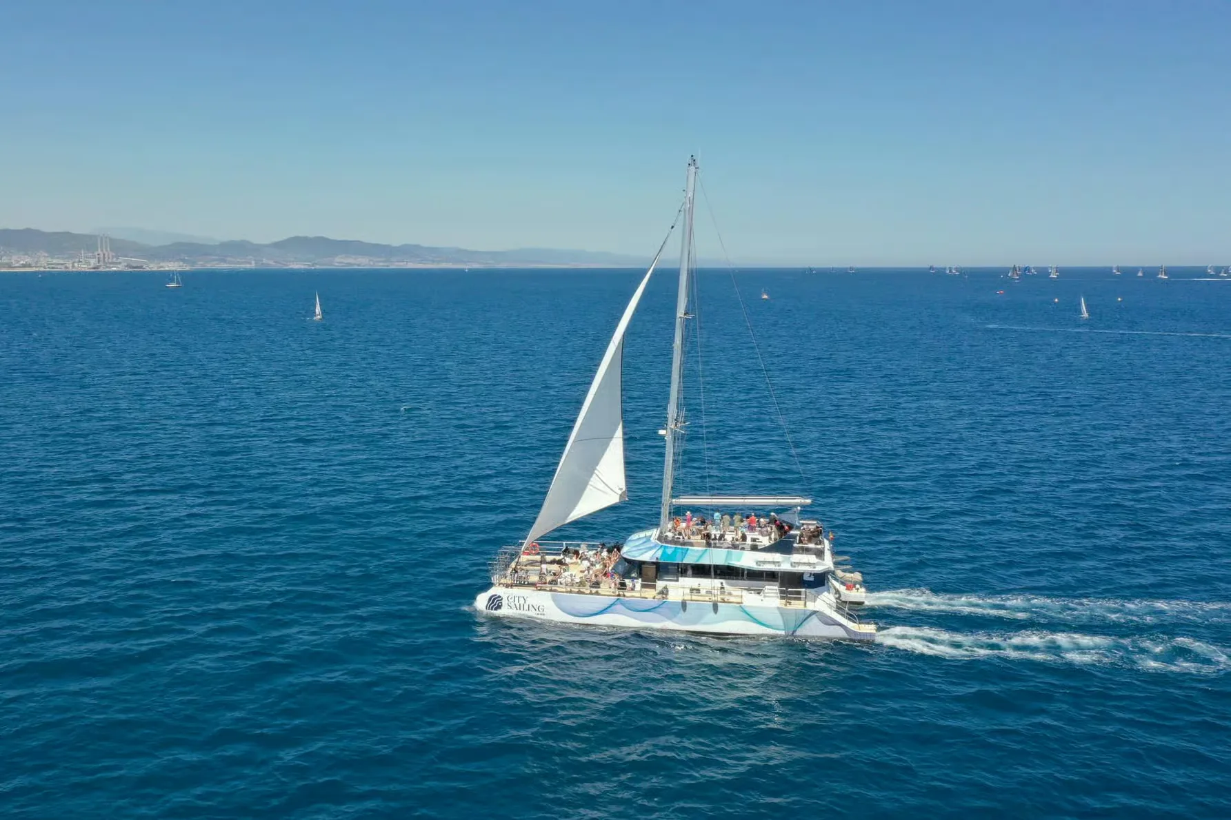 Barcelona catamaran cruise with music and sea views