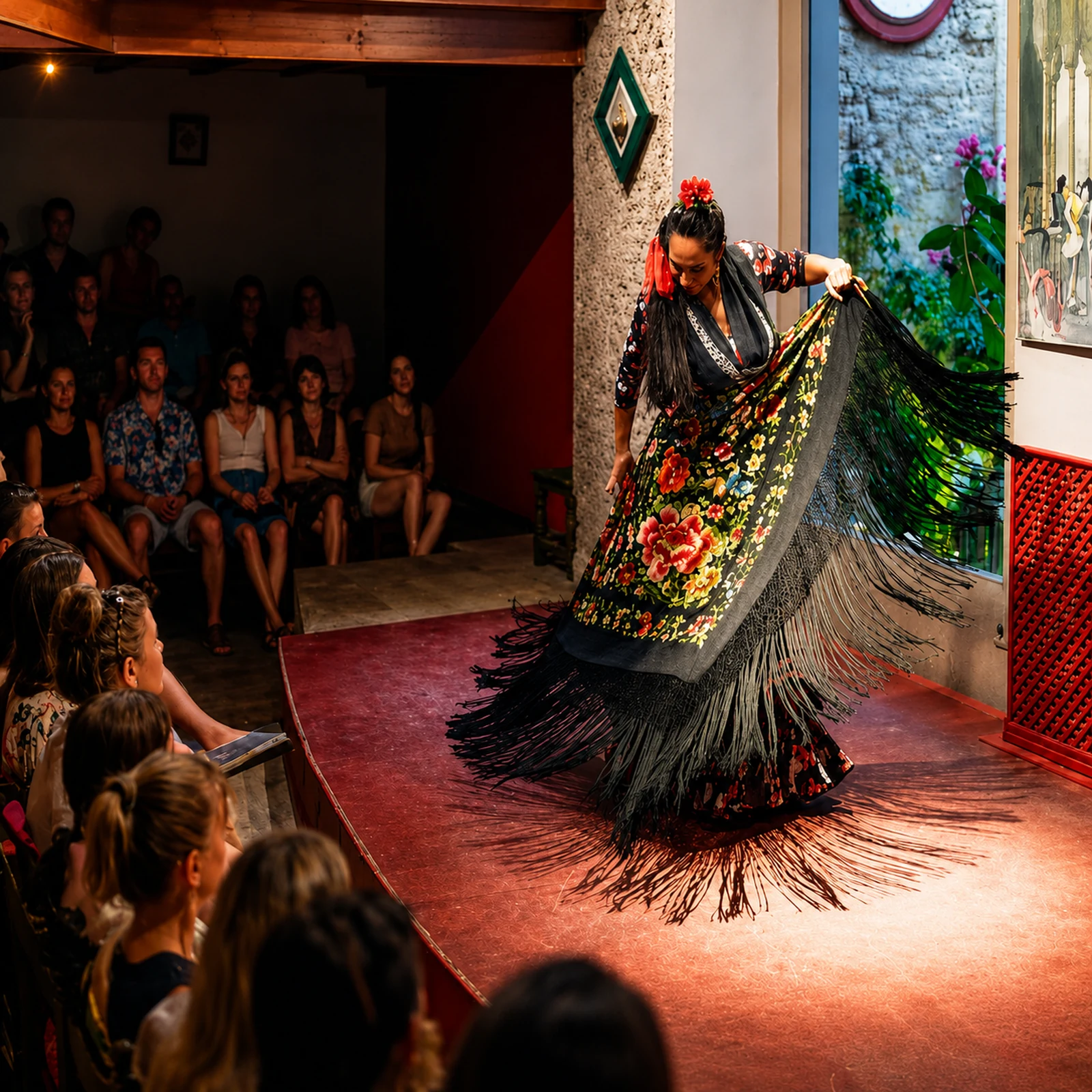 Experience a flamenco show in Seville in an intimate theatre